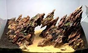 Ghép các khối đá Tiger lại với nhau để tạo thành một bố cục vách núi hoặc hang động