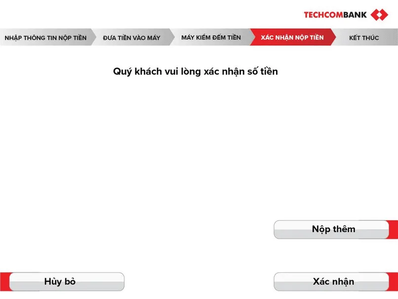 Đưa tiền vào máy, kiểm tra số tiền đã nộp và xác nhận giao dịch.